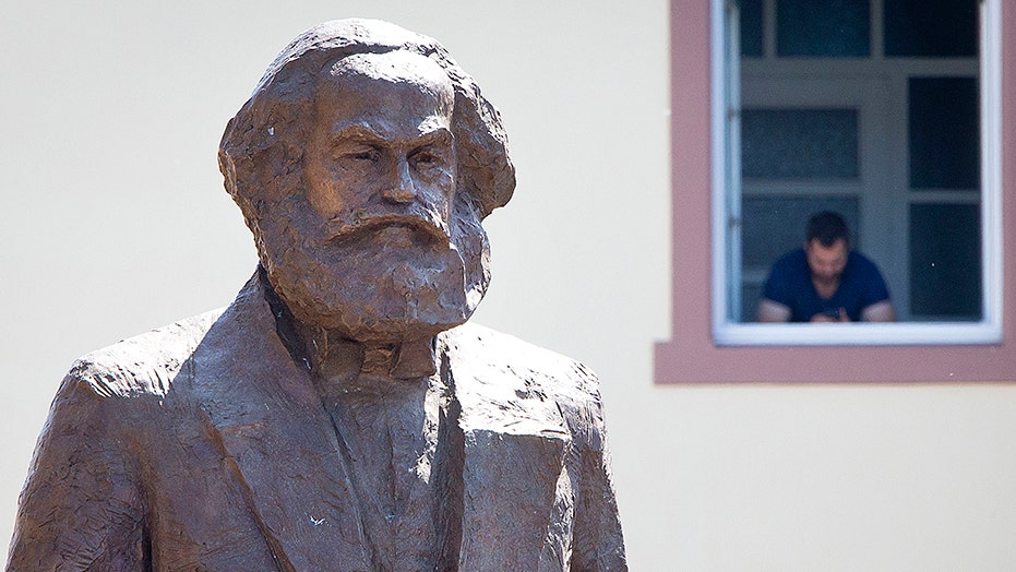 Poland apologizes after police interrupt Karl Marx meeting